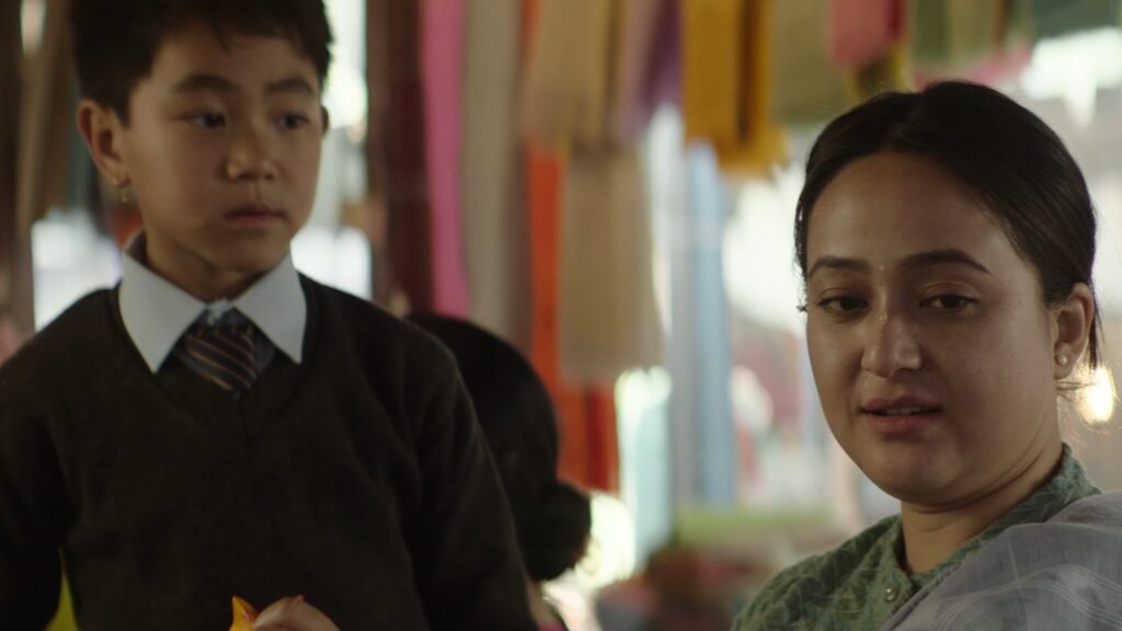 Emotional scene between mother and son in the Manipuri film Boong