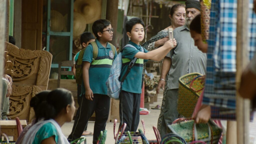 Gugun Kipgen performing in a scene from the Manipuri movie Boong